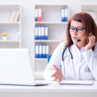 Woman doctor in telemedicine concept