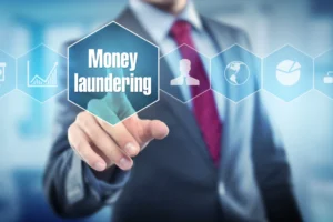 a professional in a suit interacting with a "Money Laundering" digital interface